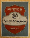 Protected By Smith & Wesson Tin Sign Ammo Gun Home Security System Pistol